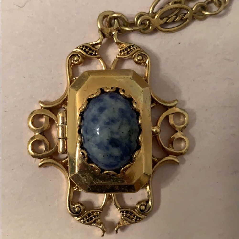 Gold tone blue marble stone locket necklace